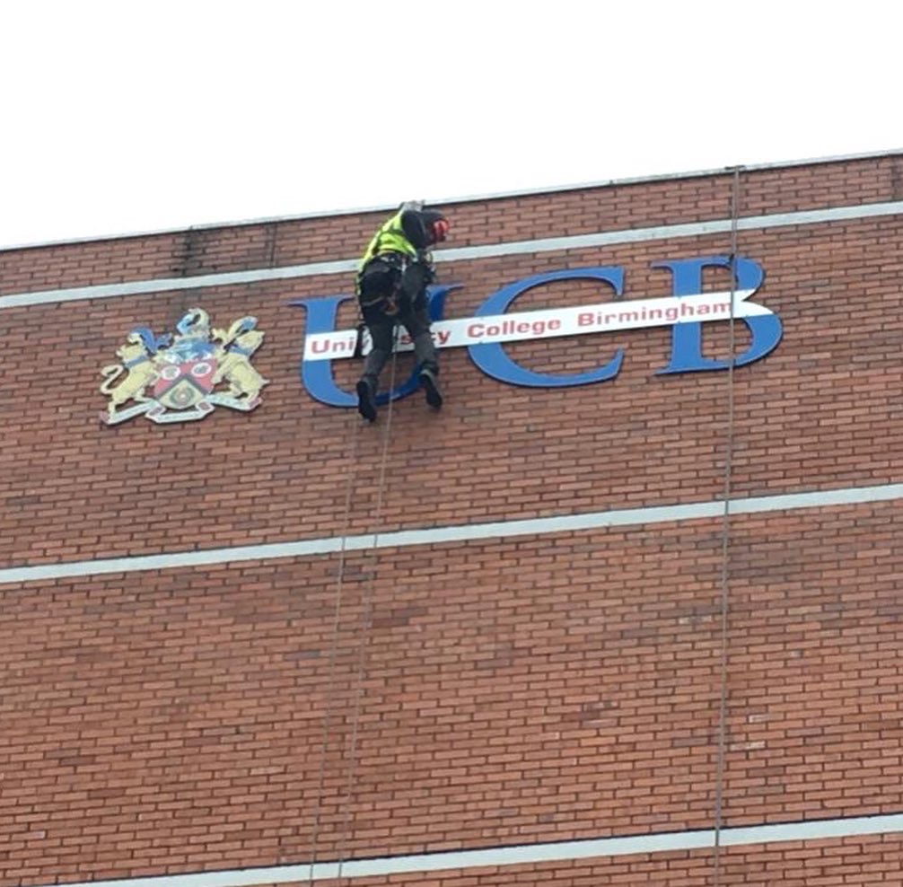 University signs Abseil signs